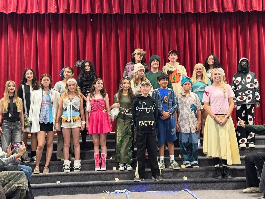 Middle school students at the costume showcase